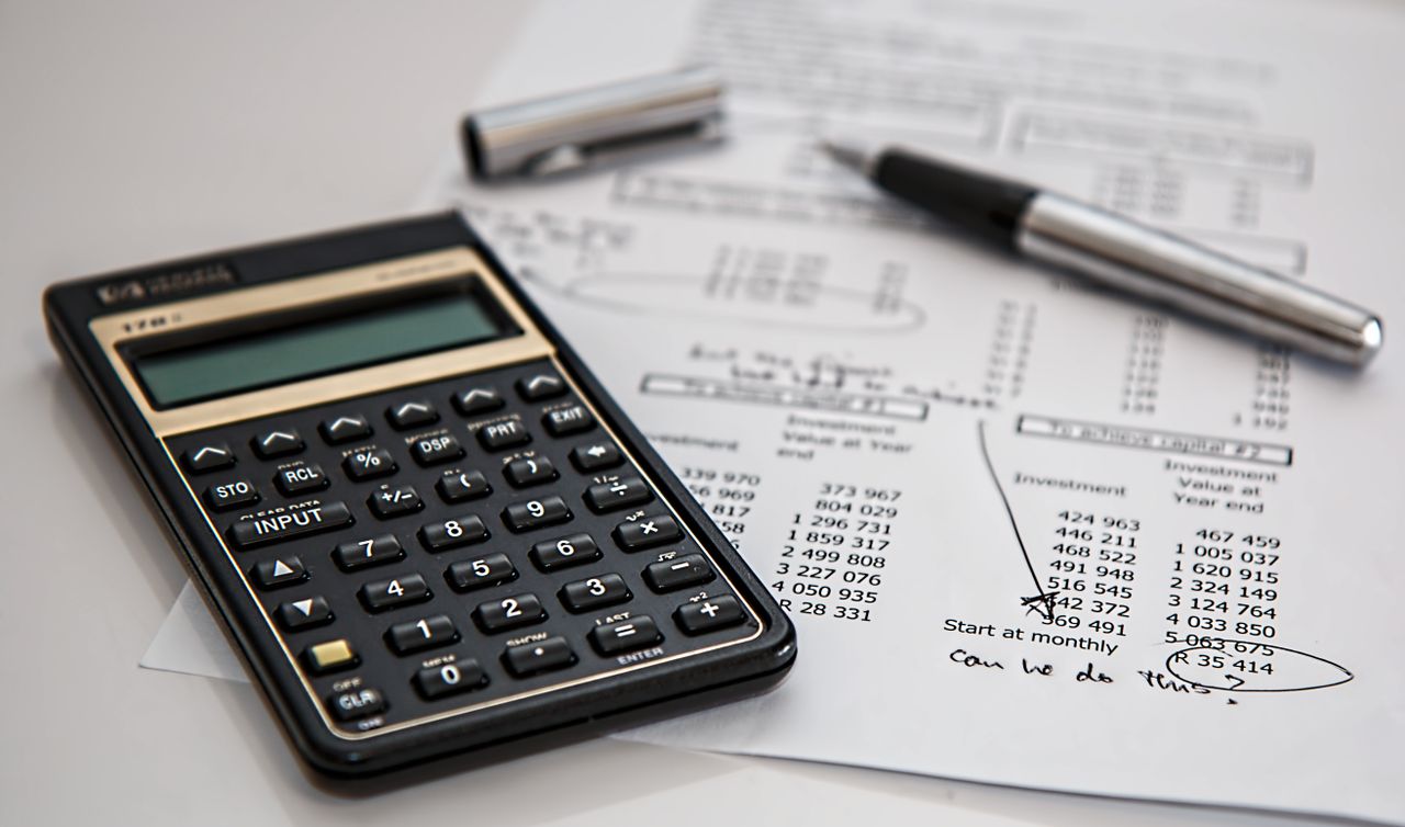 Calculator and ledger used to verify outgoing payments